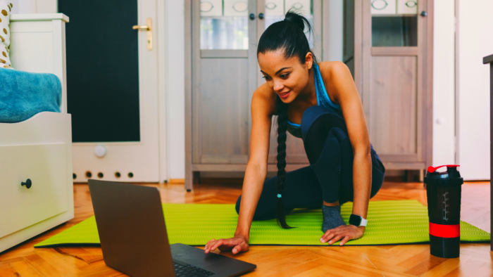 woman exercising at home