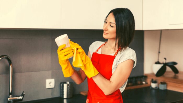 Woman doing housework in the kitchen