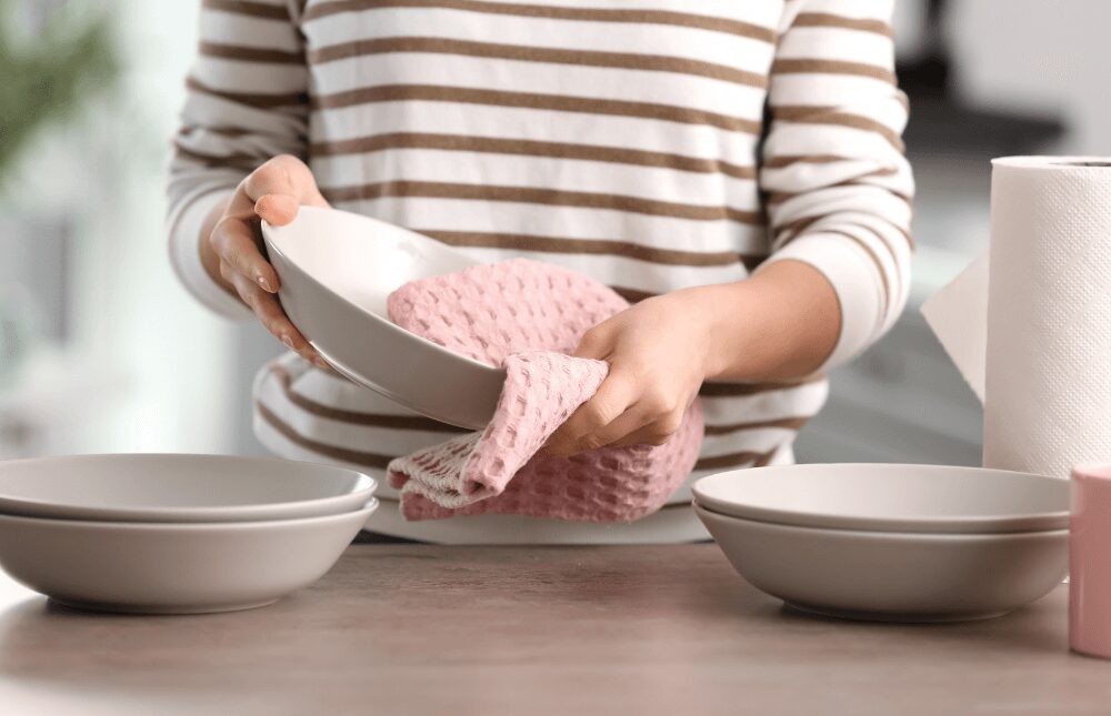 mature woman washing dishes