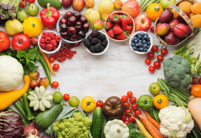 table with assorted fruits and vegetables